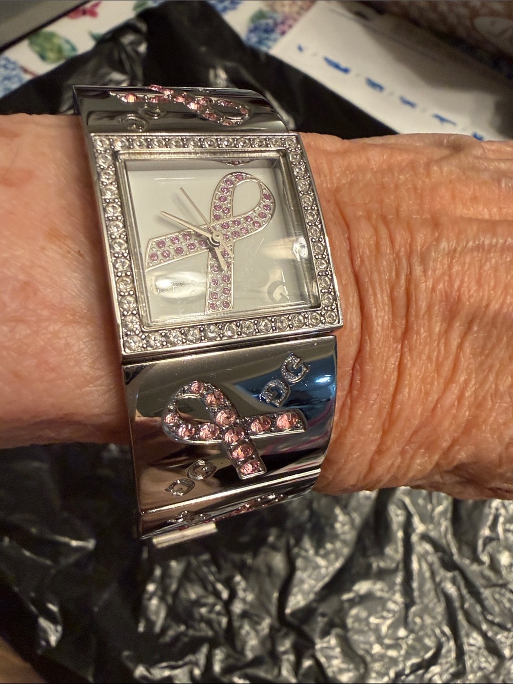 GUESS Silver-Tone Women's Bracelet Watch with Pink Ribbon Accents